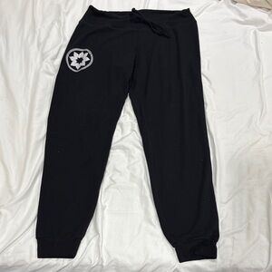 Club Pilates Black women’s Jogger Sweatpants with Heart Star Patch
